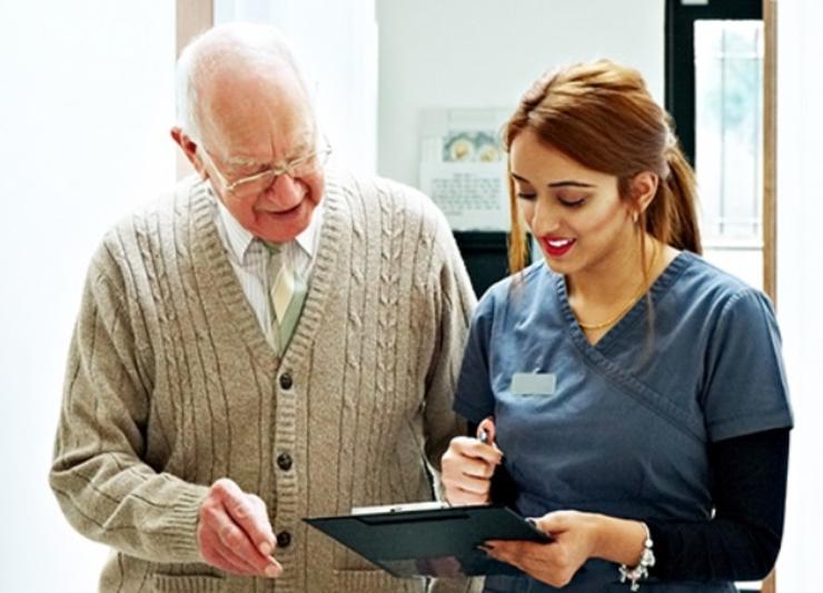 Nurse talking to patient
